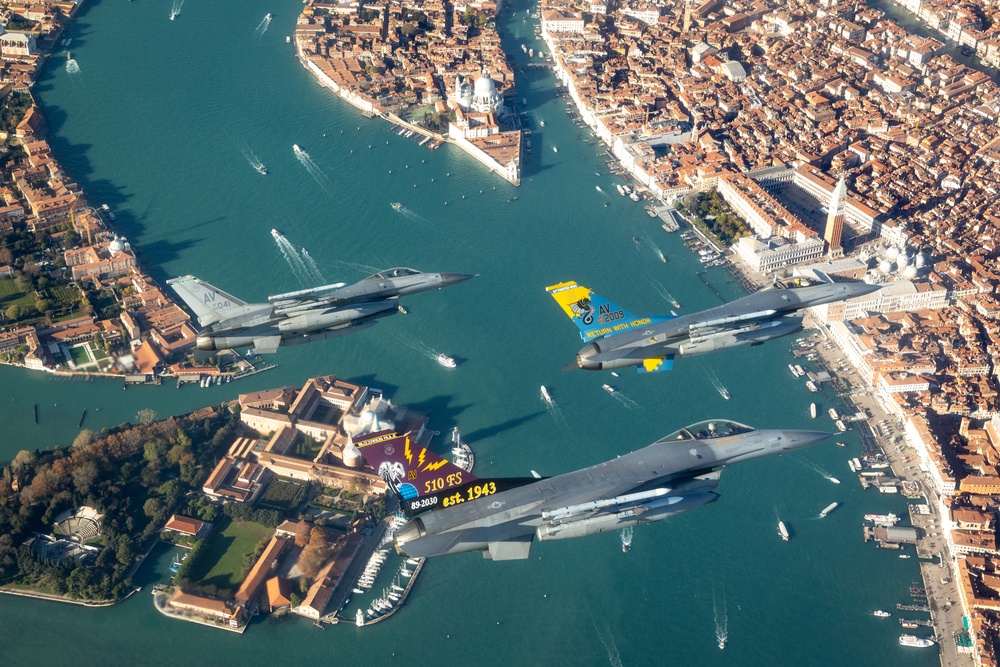 F-16s soar through the sky