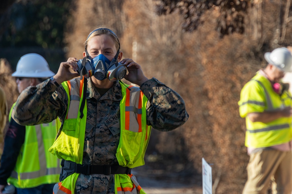 Day 5: U.S. service members dispose of burned batteries.