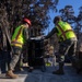 Day 5: U.S. service members dispose of burned batteries.