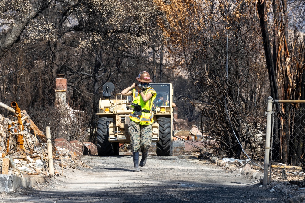 Day 5: U.S. service members dispose of burned batteries.