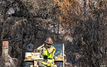 Day 5: U.S. service members dispose of burned batteries.