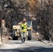 Day 5: U.S. service members dispose of burned batteries.