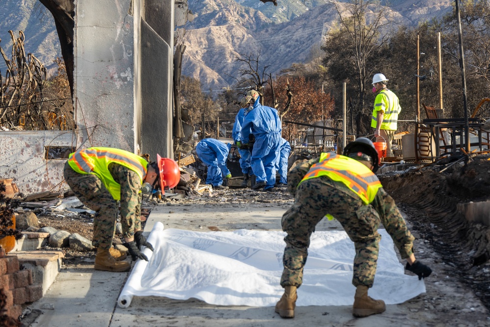 U.S. service members dispose of power walls