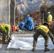 U.S. service members dispose of power walls