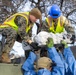 U.S. service members dispose of power walls