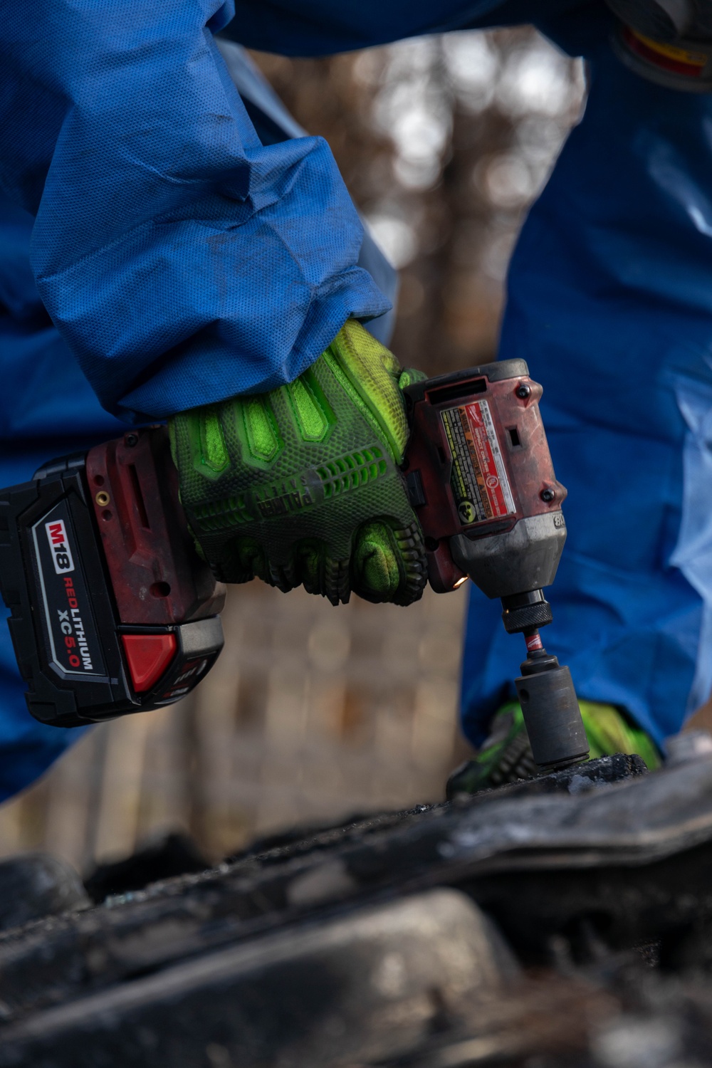 U.S. service members dispose of power walls