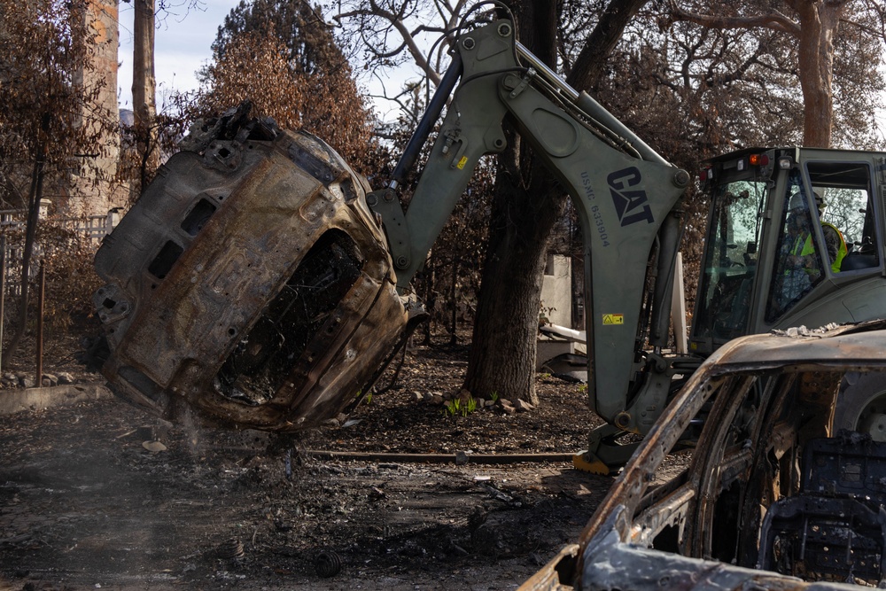 U.S. service members dispose of power walls