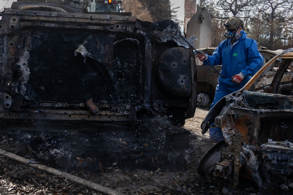 U.S. service members dispose of power walls