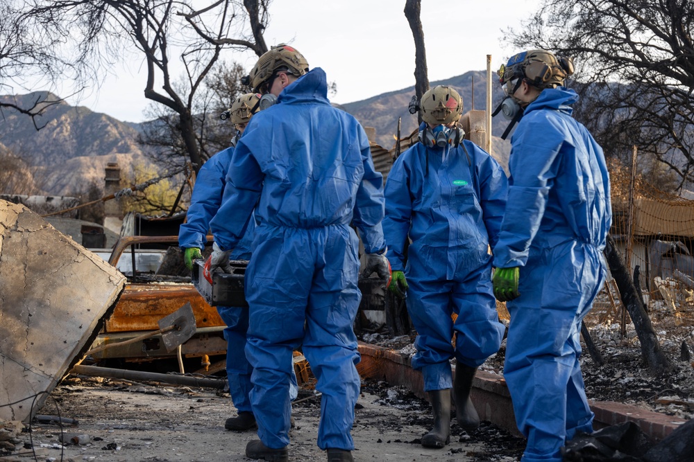 U.S. service members dispose of power walls