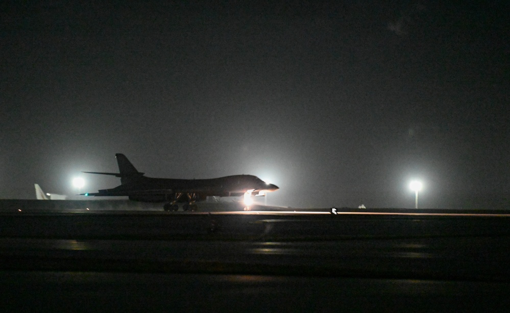 34th Expeditionary Bomb Squadron B-1B Lancers return to Andersen AFB after completing hot pit refueling mission in support of BTF 25-1