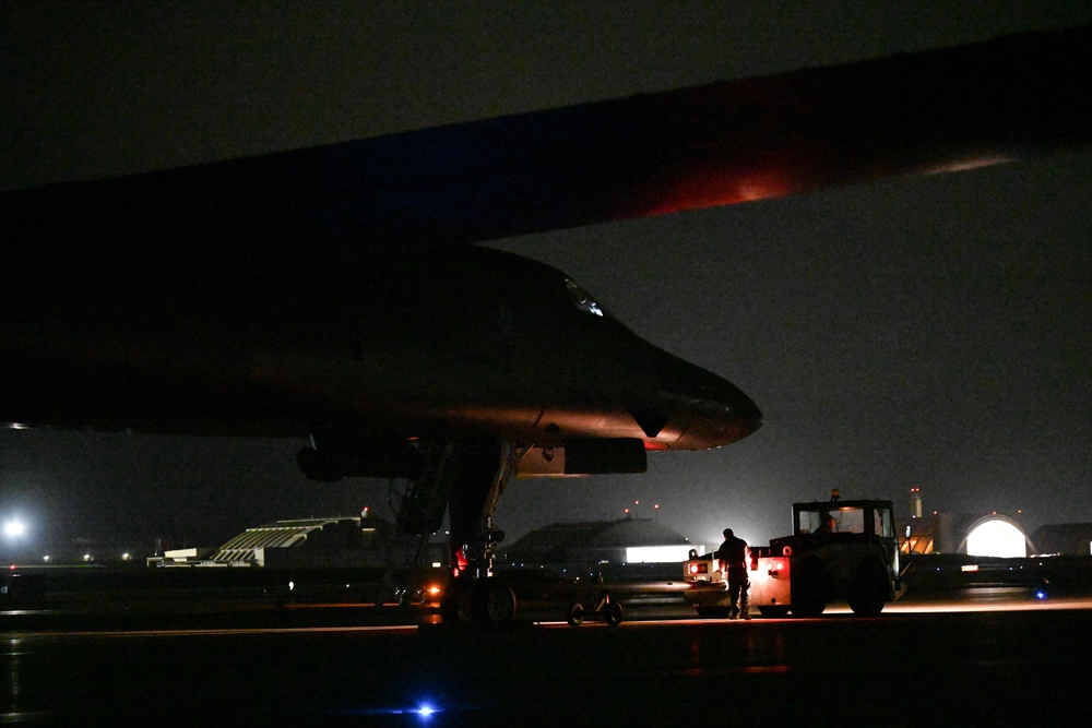 34th Expeditionary Bomb Squadron B-1B Lancers return to Andersen AFB after completing hot pit refueling mission in support of BTF 25-1