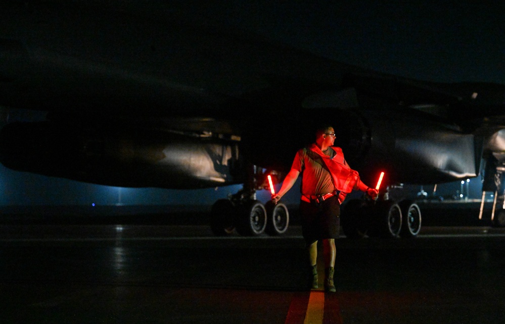 34th Expeditionary Bomb Squadron B-1B Lancers return to Andersen AFB after completing hot pit refueling mission in support of BTF 25-1