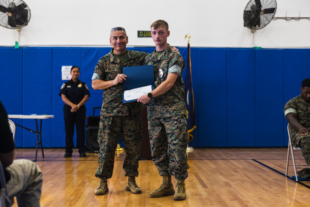 Marines, Civilians graduate Naval Security Guard Training Course