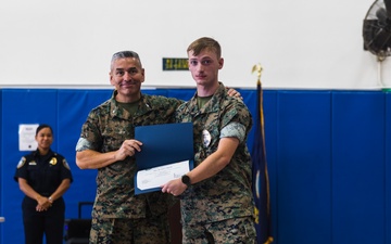 Marines, Civilians graduate Naval Security Guard Training Course