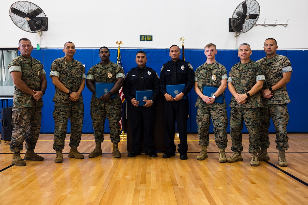 Marines, Civilians graduate Naval Security Guard Training Course