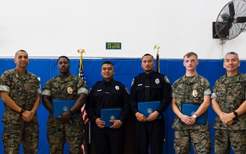 Marines, Civilians graduate Naval Security Guard Training Course