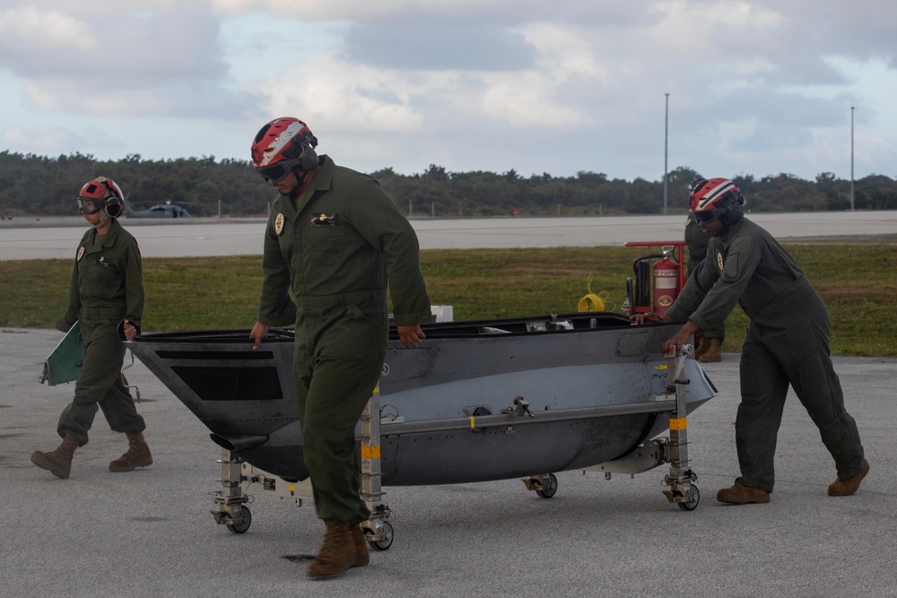 U.S. Marines load F-35B weaponry during Cope North 25