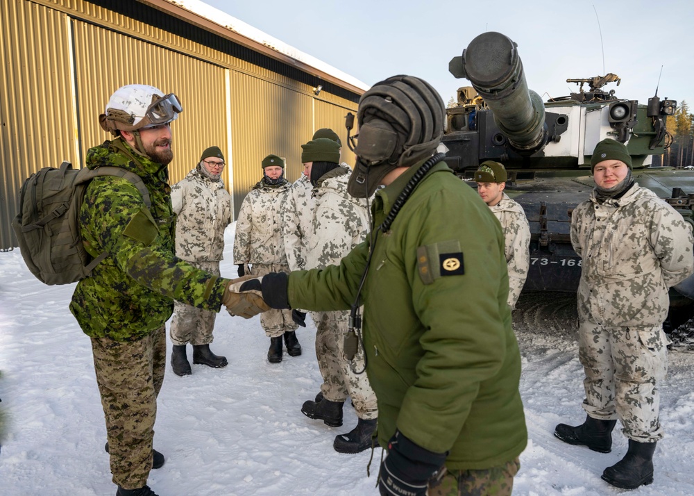 10th Mountain, 11th Airborne Division, Canadian Soldiers explore the Leopard 2A4