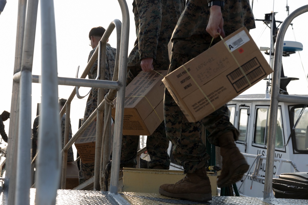 Marines with MWSS-272 prepare to leave port in the Bahamas