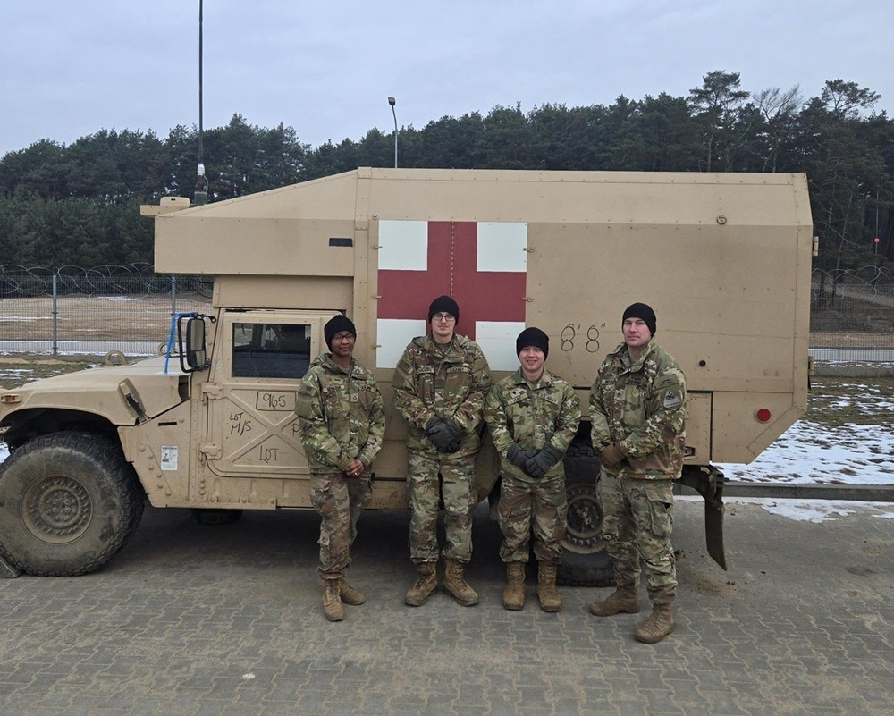 U.S. Army medics rendered aid to Polish allies following vehicle accident