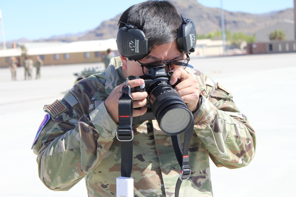 Public Affairs Tech Sgt. Anthony Pham captures imagery during annual training