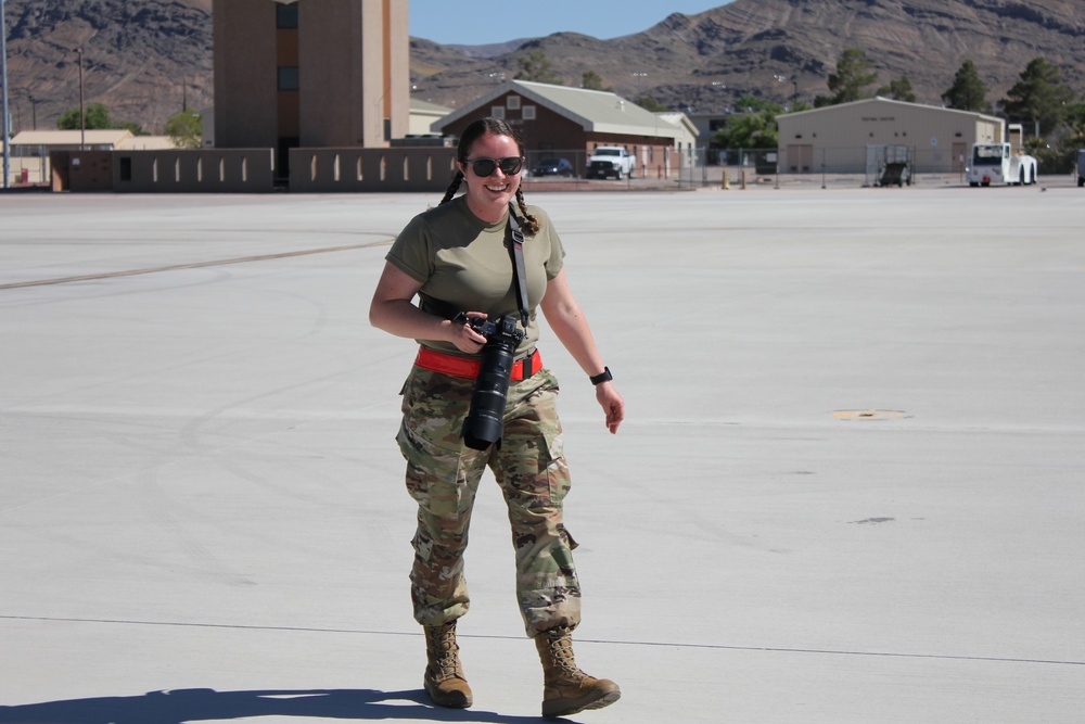 Public Affairs Sr. Airman Kayla Barker covers wing annual training