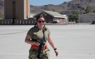 Public Affairs Sr. Airman Kayla Barker covers wing annual training