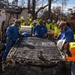 Day 7: U.S. service members dispose of burned batteries