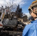 Day 7: U.S. service members dispose of burned batteries