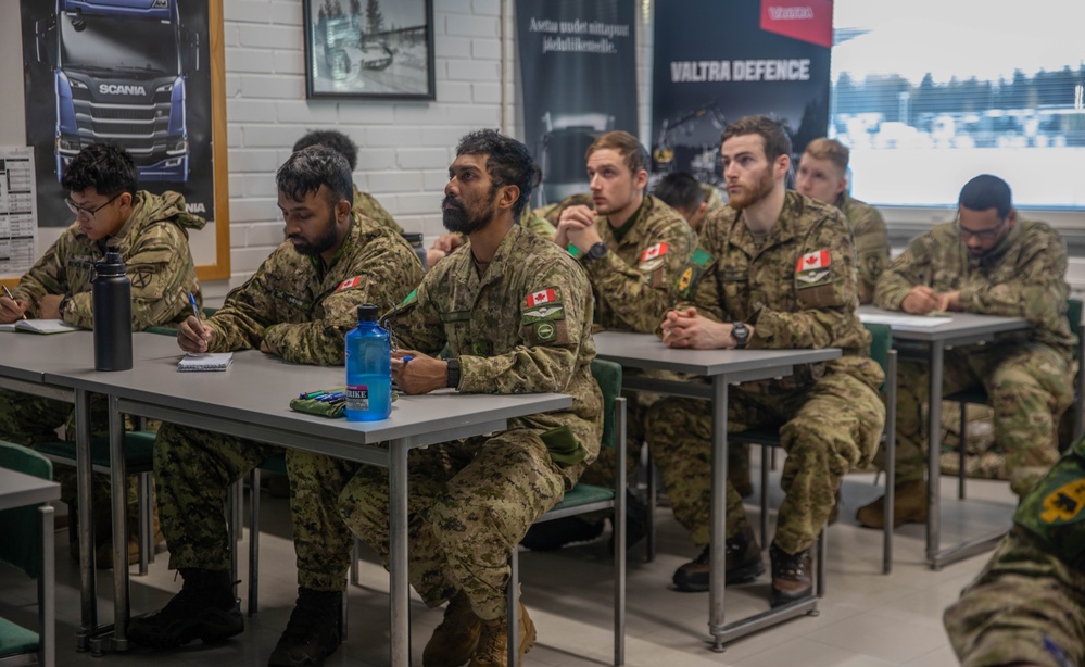 10th Mountain Division and Canadian soldiers participate in drivers training during Arctic 25