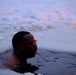 Virginia National Guard Soldiers participate in Finnish past-time of “avanto” or ice-hole swimming during Arctic Forge 25