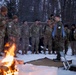 Virginia National Guard Soldiers participate in Finnish past-time of “avanto” or ice-hole swimming during Arctic Forge 25