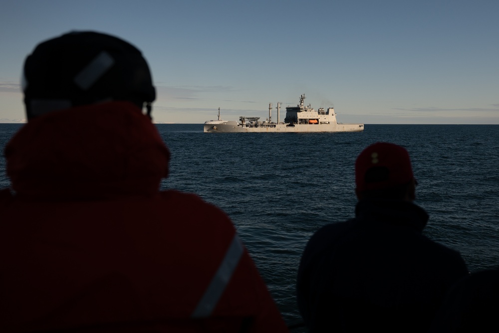 USCGC Polar Star (WAGB 10) conducts crew exchange in McMurdo Sound during Operation Deep Freeze