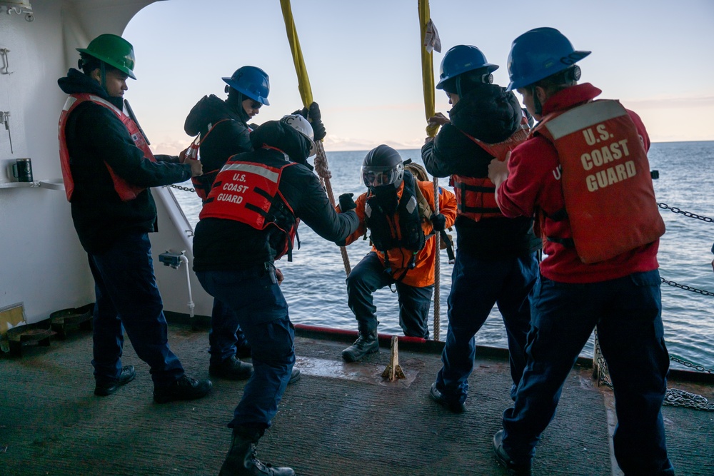 USCGC Polar Star (WAGB 10) conducts crew exchange in McMurdo Sound during Operation Deep Freeze