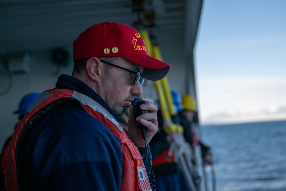 USCGC Polar Star (WAGB 10) conducts crew exchange in McMurdo Sound during Operation Deep Freeze