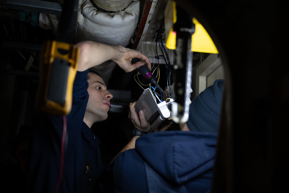 USCGC Polar Star (WAGB 10) conducts crew exchange in McMurdo Sound during Operation Deep Freeze