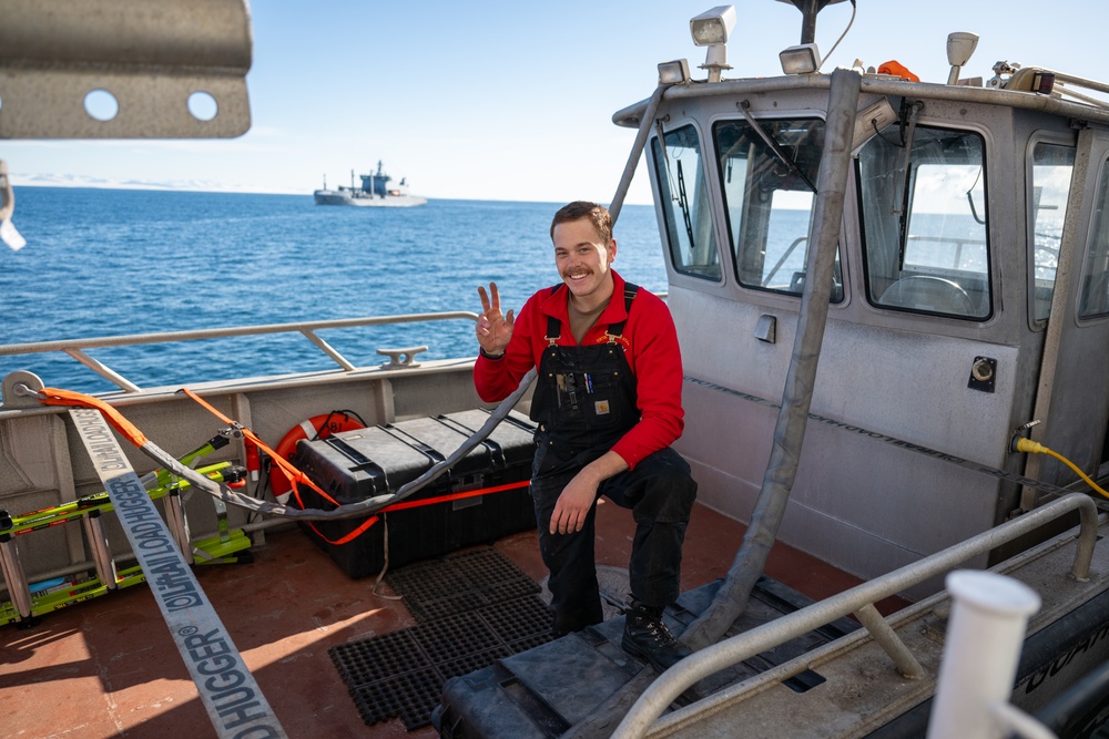 USCGC Polar Star (WAGB 10) conducts crew exchange in McMurdo Sound during Operation Deep Freeze