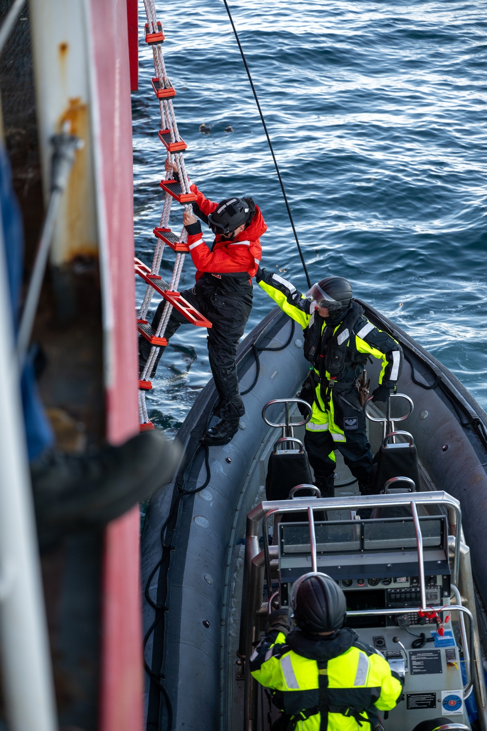 USCGC Polar Star (WAGB 10) conducts crew exchange in McMurdo Sound during Operation Deep Freeze