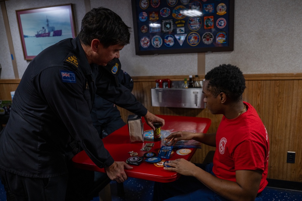 USCGC Polar Star (WAGB 10) conducts crew exchange in McMurdo Sound during Operation Deep Freeze