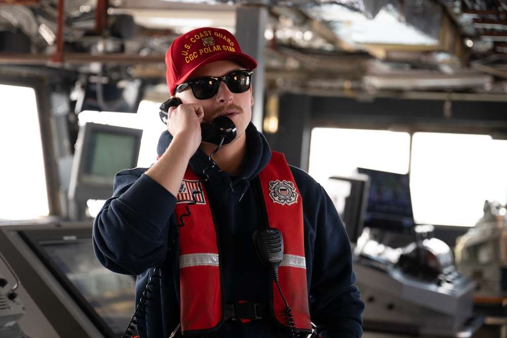 USCGC Polar Star (WAGB 10) conducts crew exchange in McMurdo Sound during Operation Deep Freeze