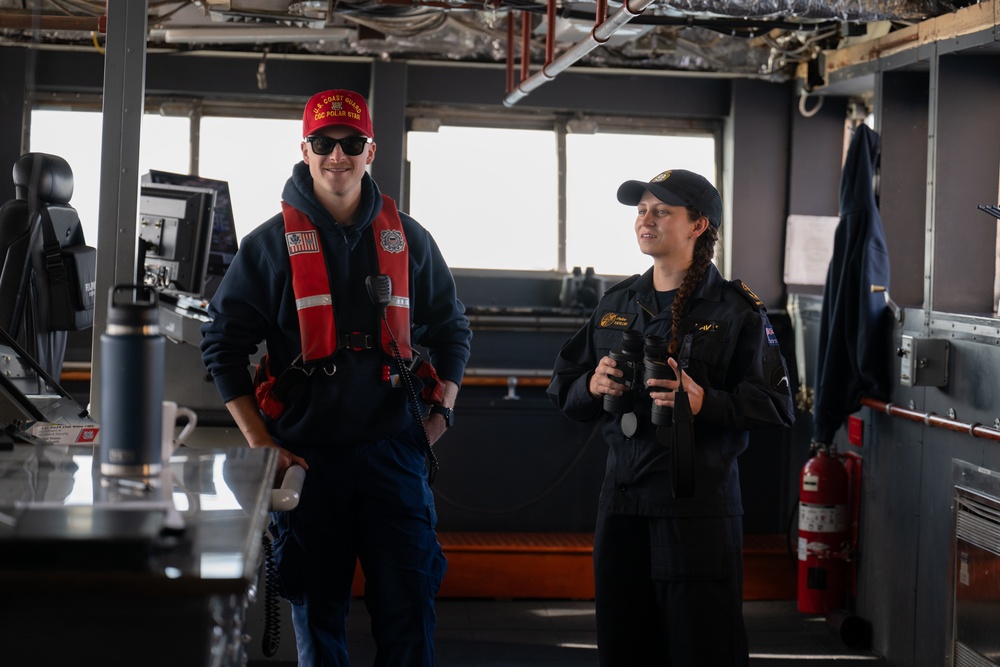 USCGC Polar Star (WAGB 10) conducts crew exchange in McMurdo Sound during Operation Deep Freeze