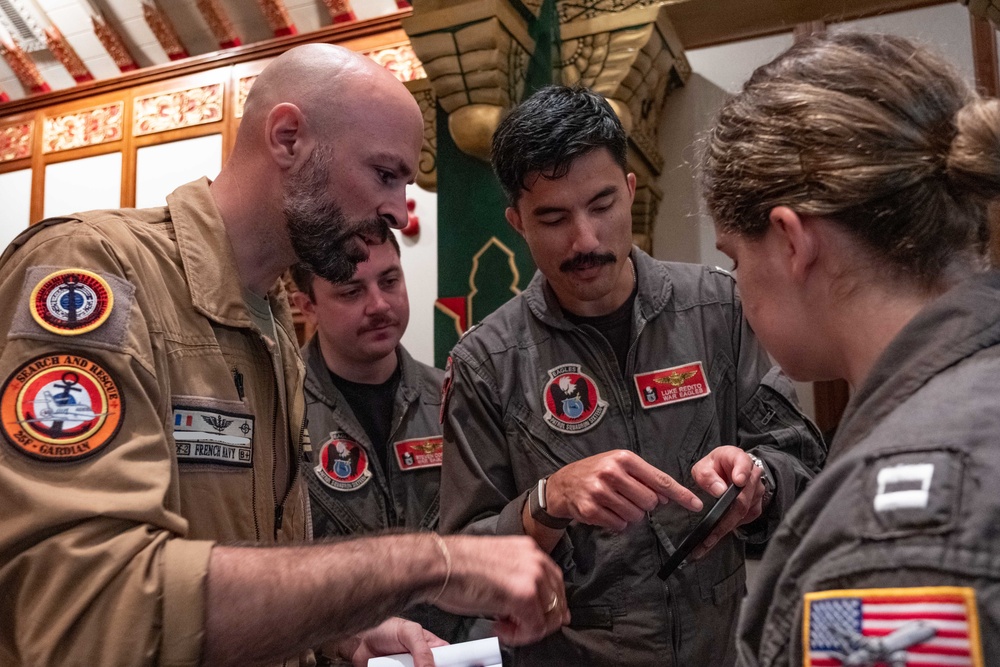 U.S. Navy Sailors participate in Mutilateral Naval Exercise Komodo 2025 presail brief
