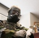 374 AW command team dons MOPP gear in preparation for BM 25-2