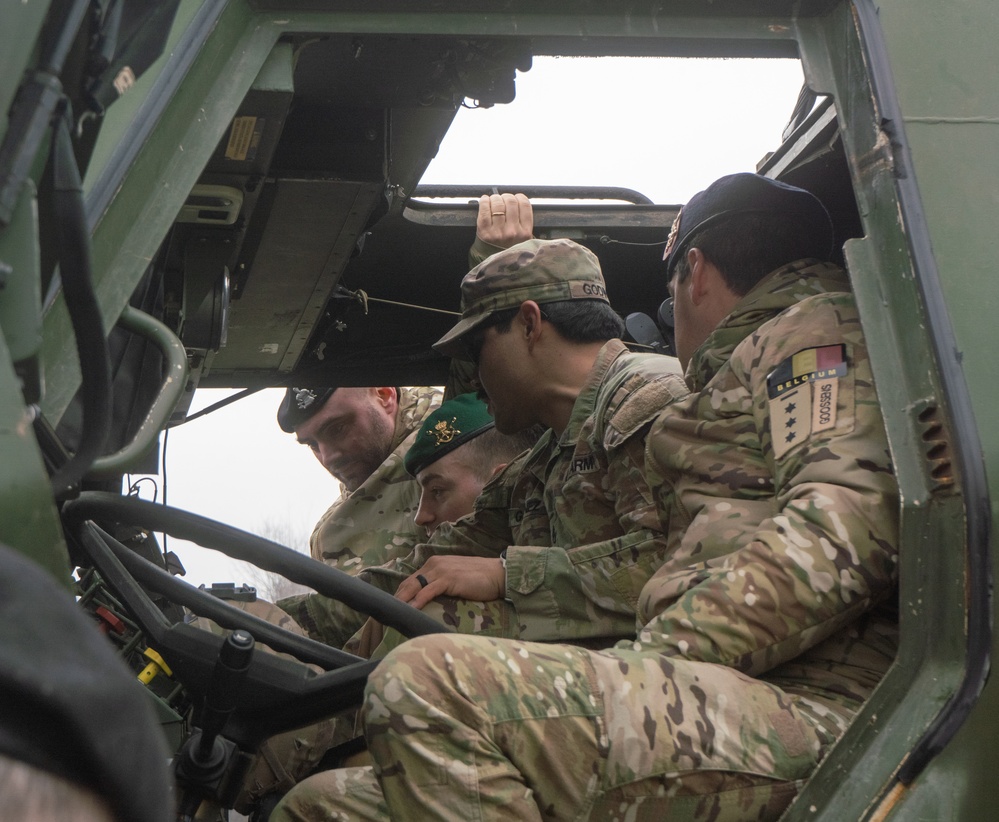 Belgian Army Leaders visit 3-321 FAR static HIMARS display
