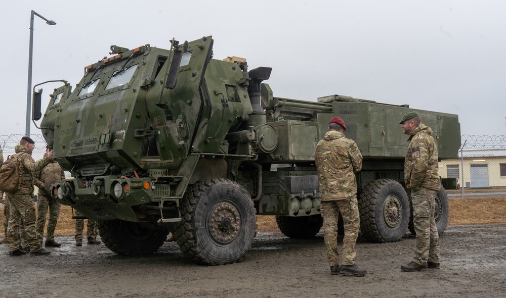 Belgian Army Leaders visit 3-321 FAR static HIMARS display