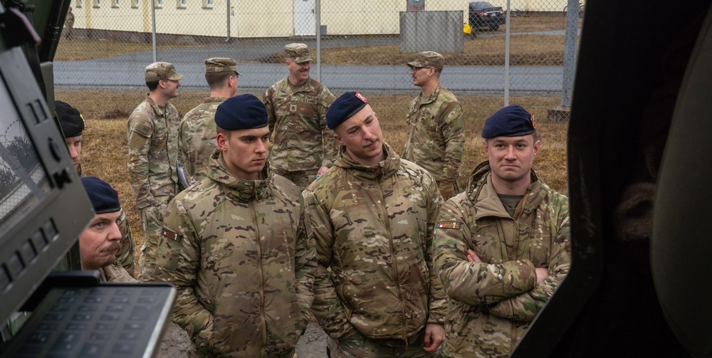 Belgian Army Leaders visit 3-321 FAR static HIMAR display
