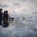 USS Gerald R. Ford (CVN 78) Sailors shovel snow during a winter storm