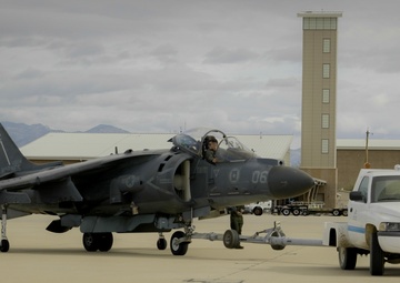 Marine Attack Squadron (VMA) 231 tows an AV-8B Harrier II to Pima Air and Space Museum