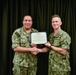 LT Clint McClanahan presents MU2 Omar Machado-Rios with Navy and Marine Corps Achievement Medal