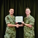 LT Clint McClanahan presents MU3 Damian Chambers with Navy and Marine Corps Achievement Medal